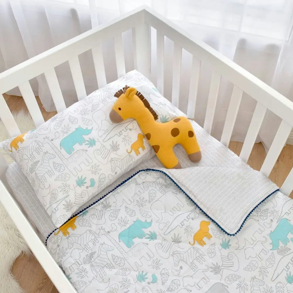 Living Textiles | Quilted Cot Comforter - Urban Safari