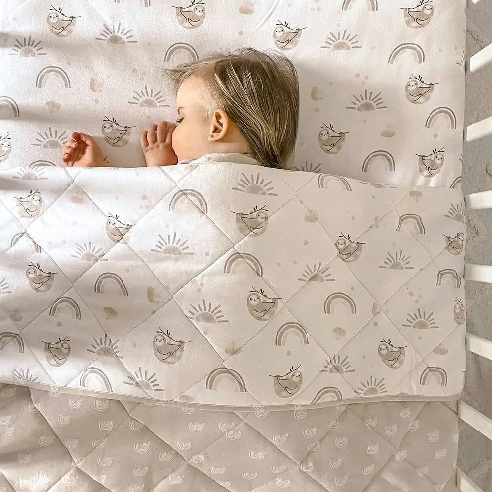 Living Textiles | Reversible Quilted Cot Comforter - Happy Sloth