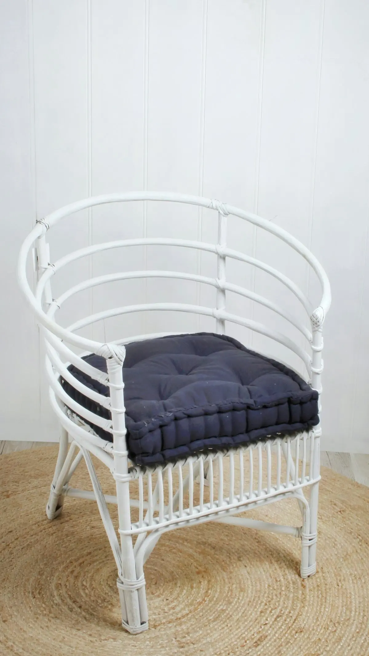 White Cane Chair With Navy Cushion