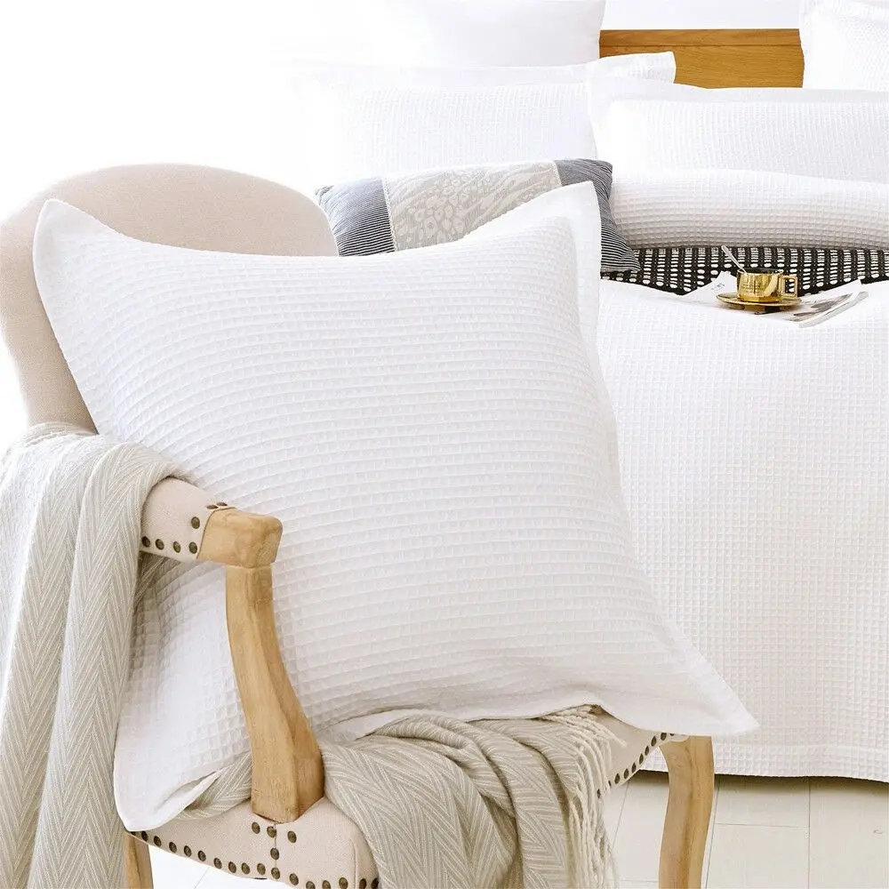 A pair of Bamboo Cotton White Waffle Standard Pillowcases or European Cushion covers