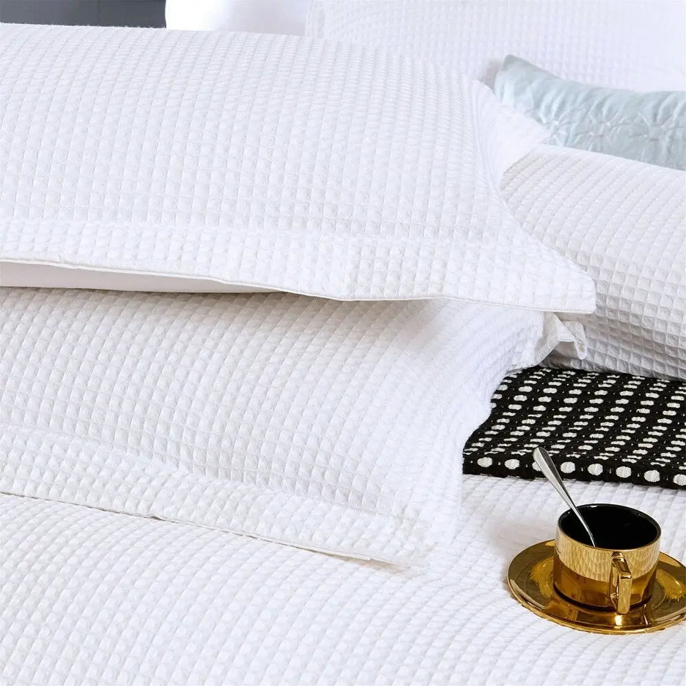 A pair of Bamboo Cotton White Waffle Standard Pillowcases or European Cushion covers