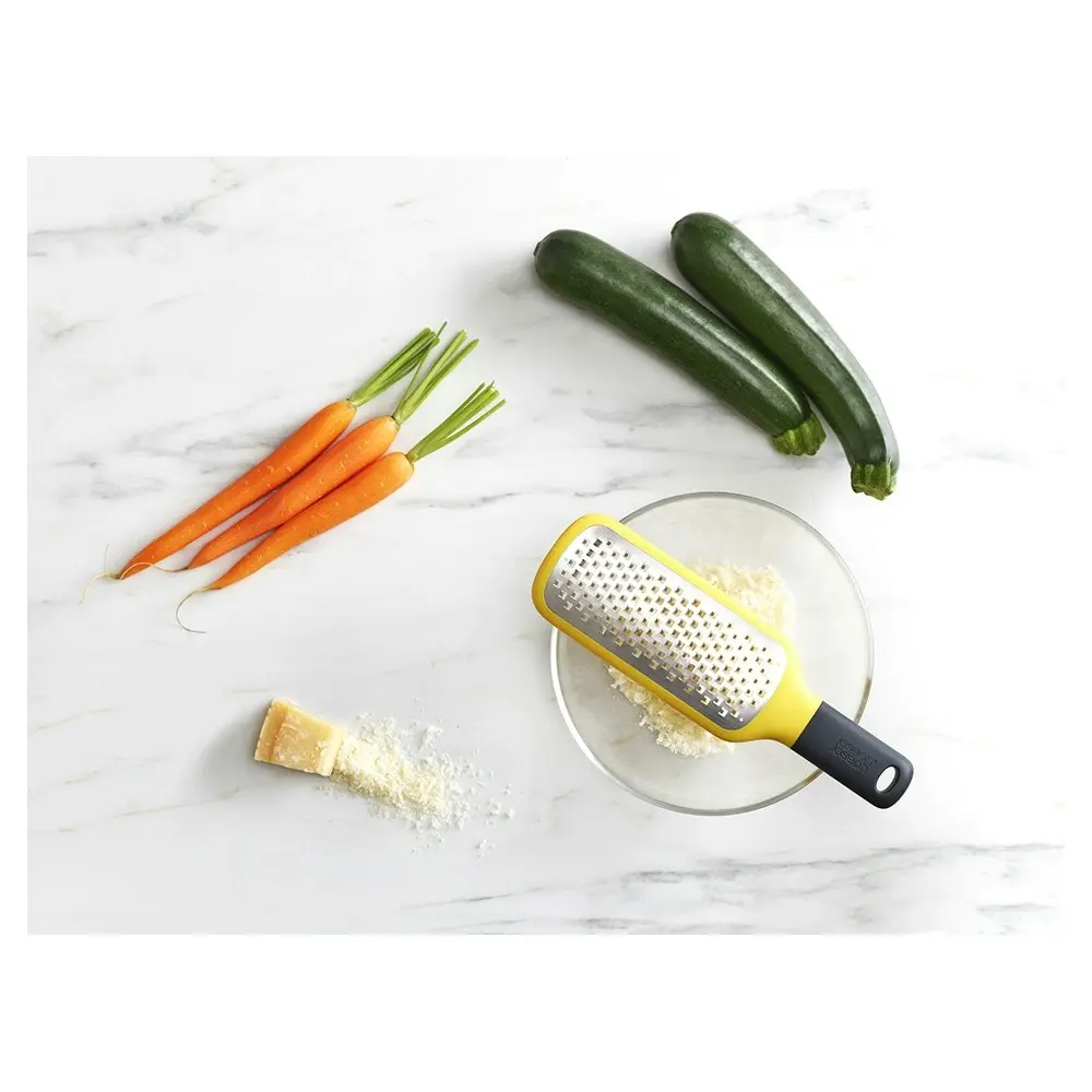 Joseph Joseph Grip Stainless Steel Coarse Paddle Grater with Bowl Grip Yellow