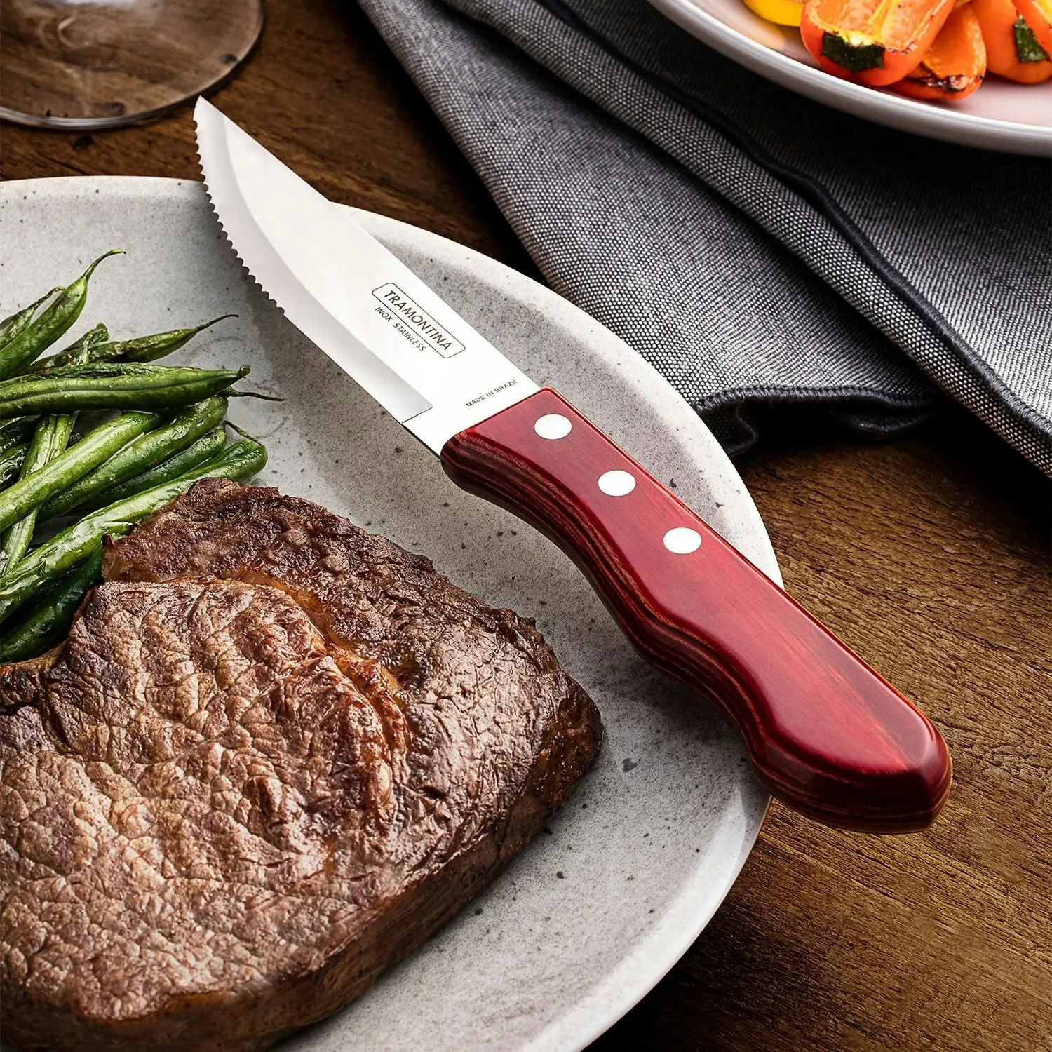 Tramontina 4-Piece Jumbo Steak Kinife Set Stainless-Steel and Treated Red Polywood handles