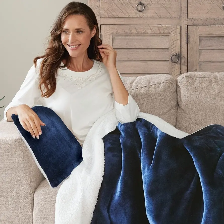 Navy throw with sherpa reverse