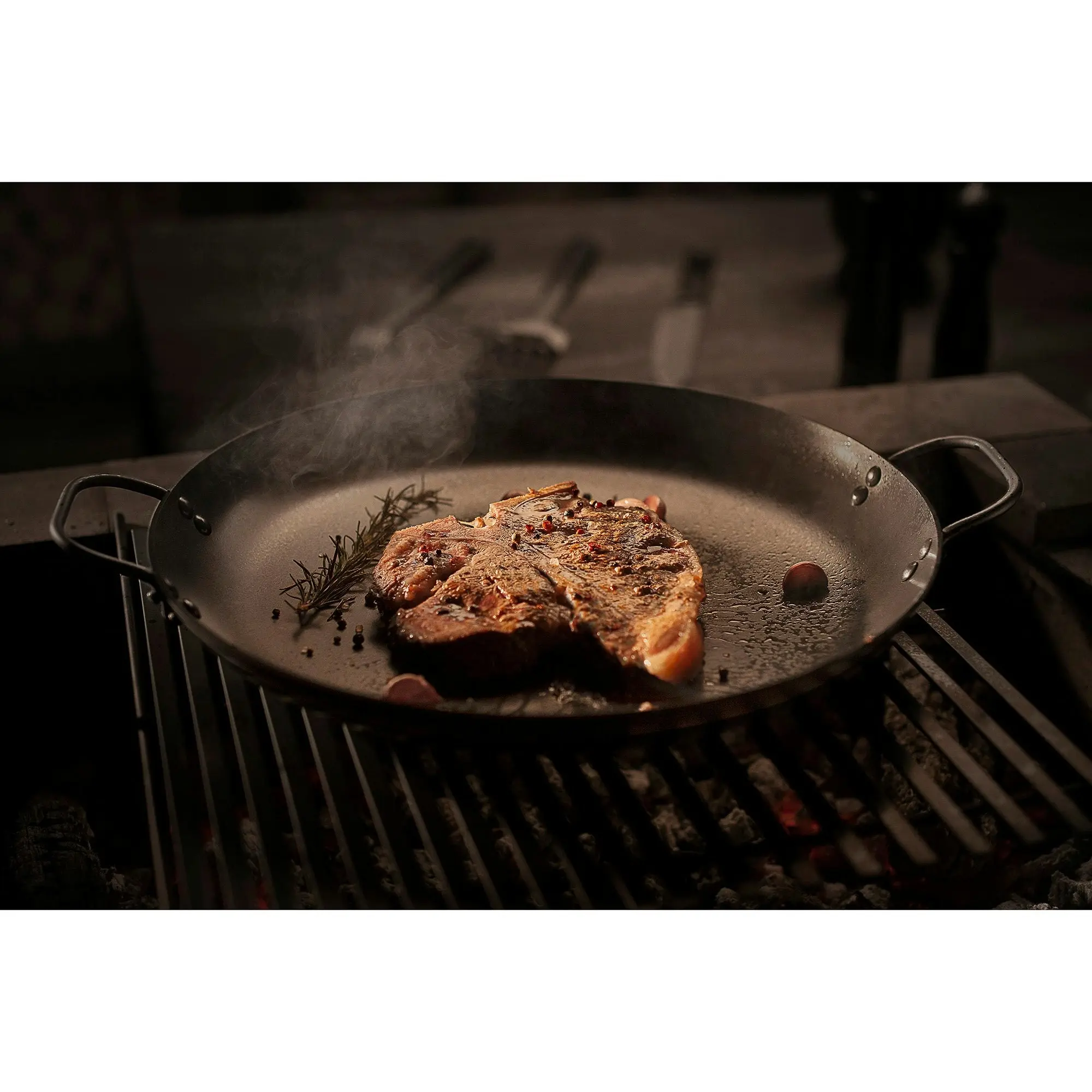 Tramontina Churrasco Black 40 cm Round Griddle Pan in Nitrocarburized Carbon Steel