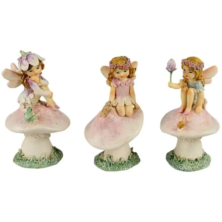 Fairy Friends Sitting on Mushroom