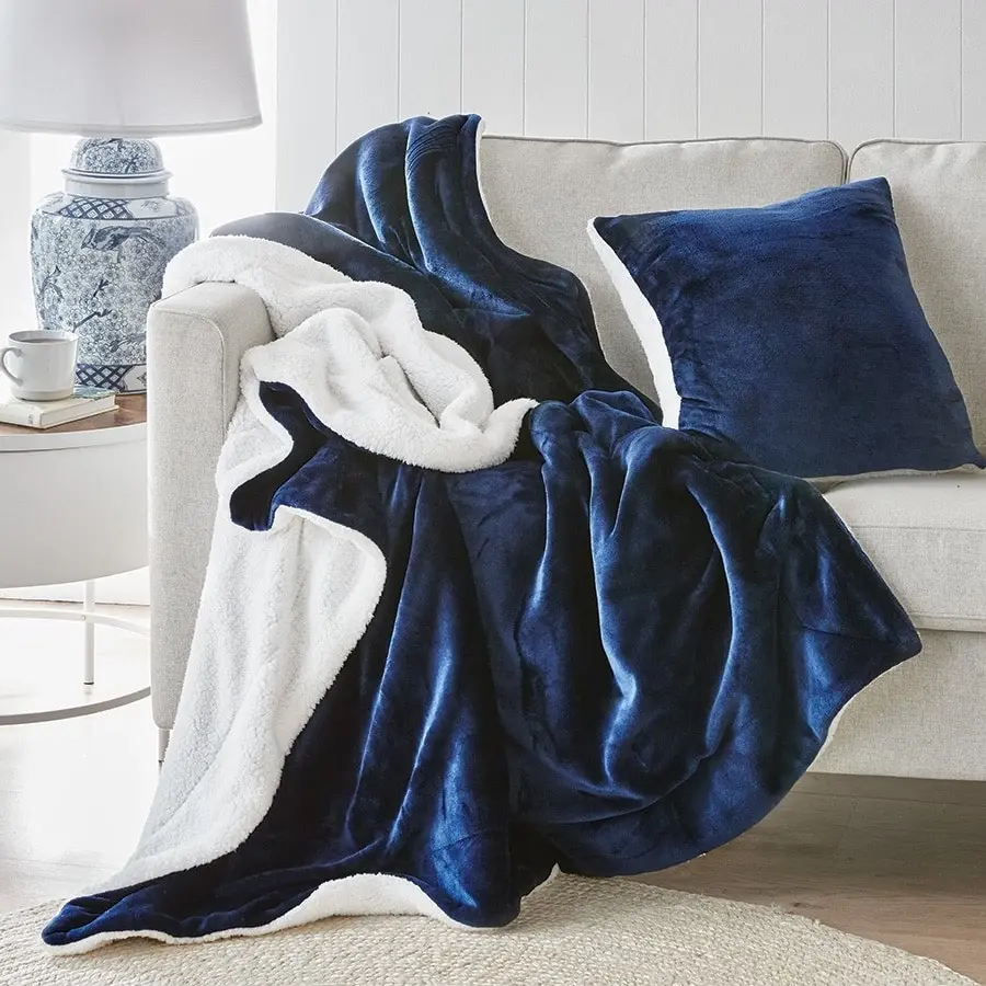 Navy throw with sherpa reverse